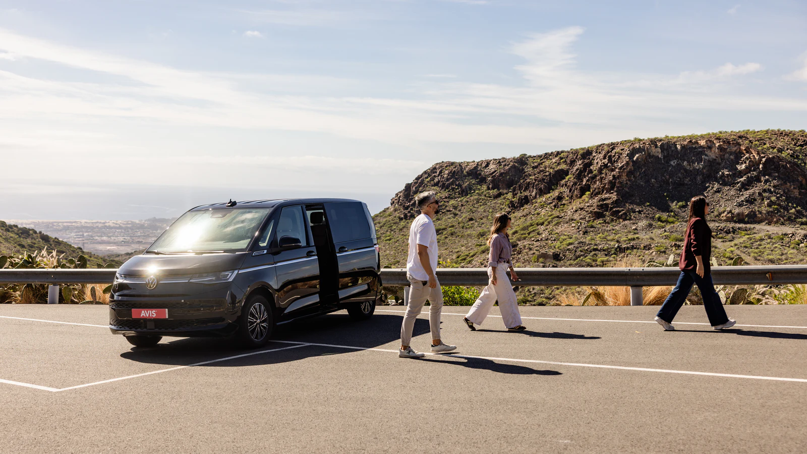 Avis people carrier and travellers on a Tenerife mountain road