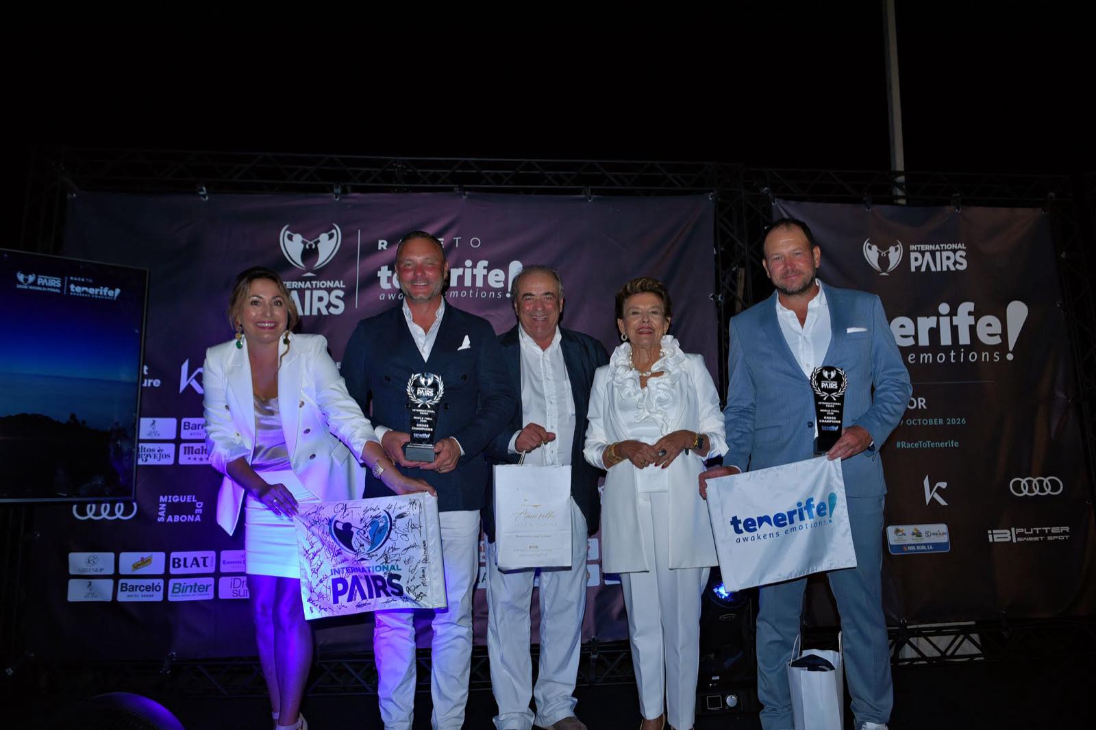 Christer Carling and Pier Sergio Piccinetti receive their Gross Championship trophies.