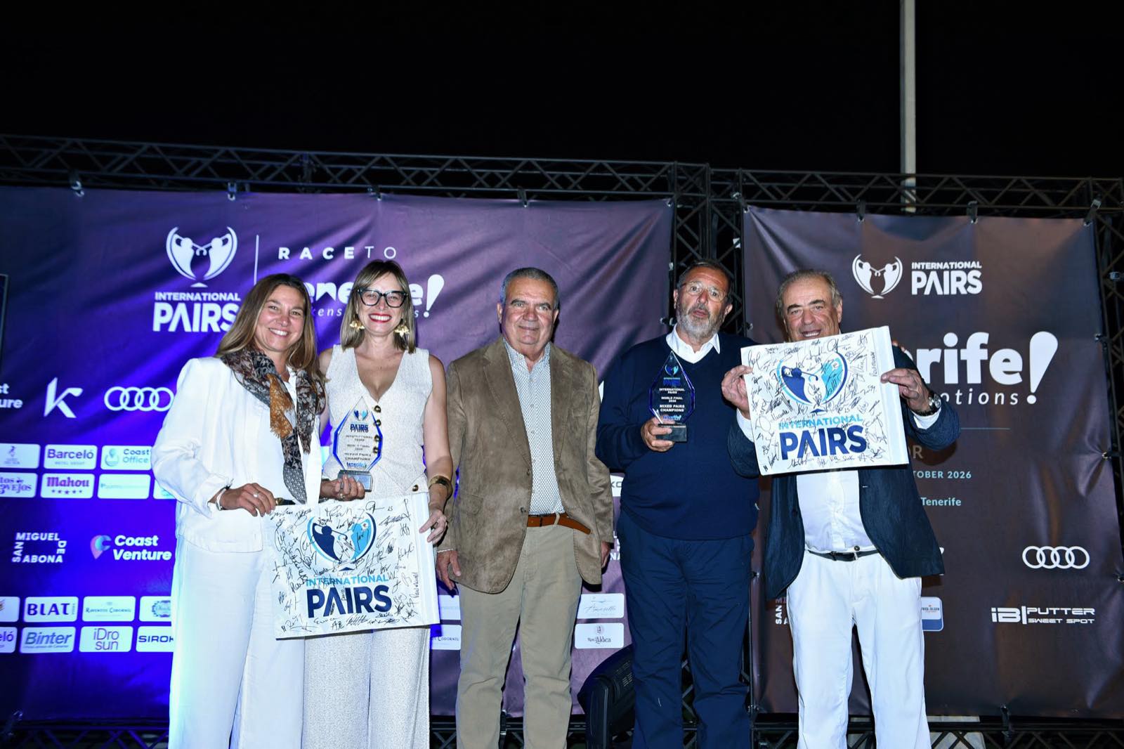 Nicoletta Ricci and Giorgio Carpani celebrate the Mixed Pairs title at the gala.